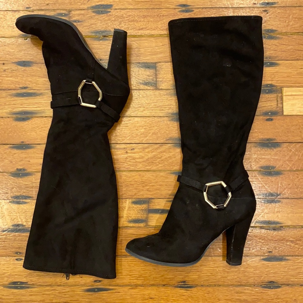 The perfect tall black boot! Get compliments every time you wear these. Classic.